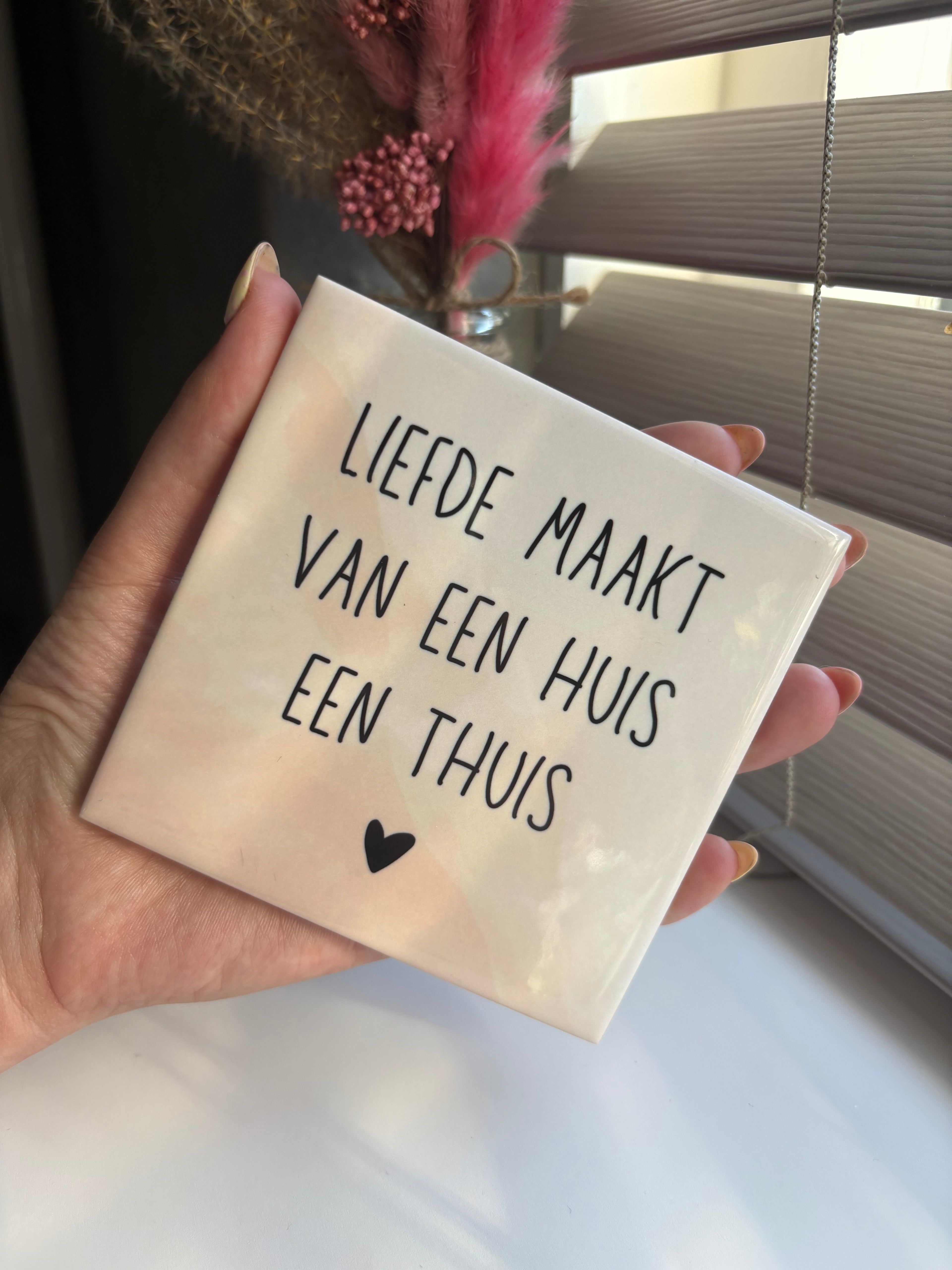 Tegeltje liefde maakt van een huis een thuis