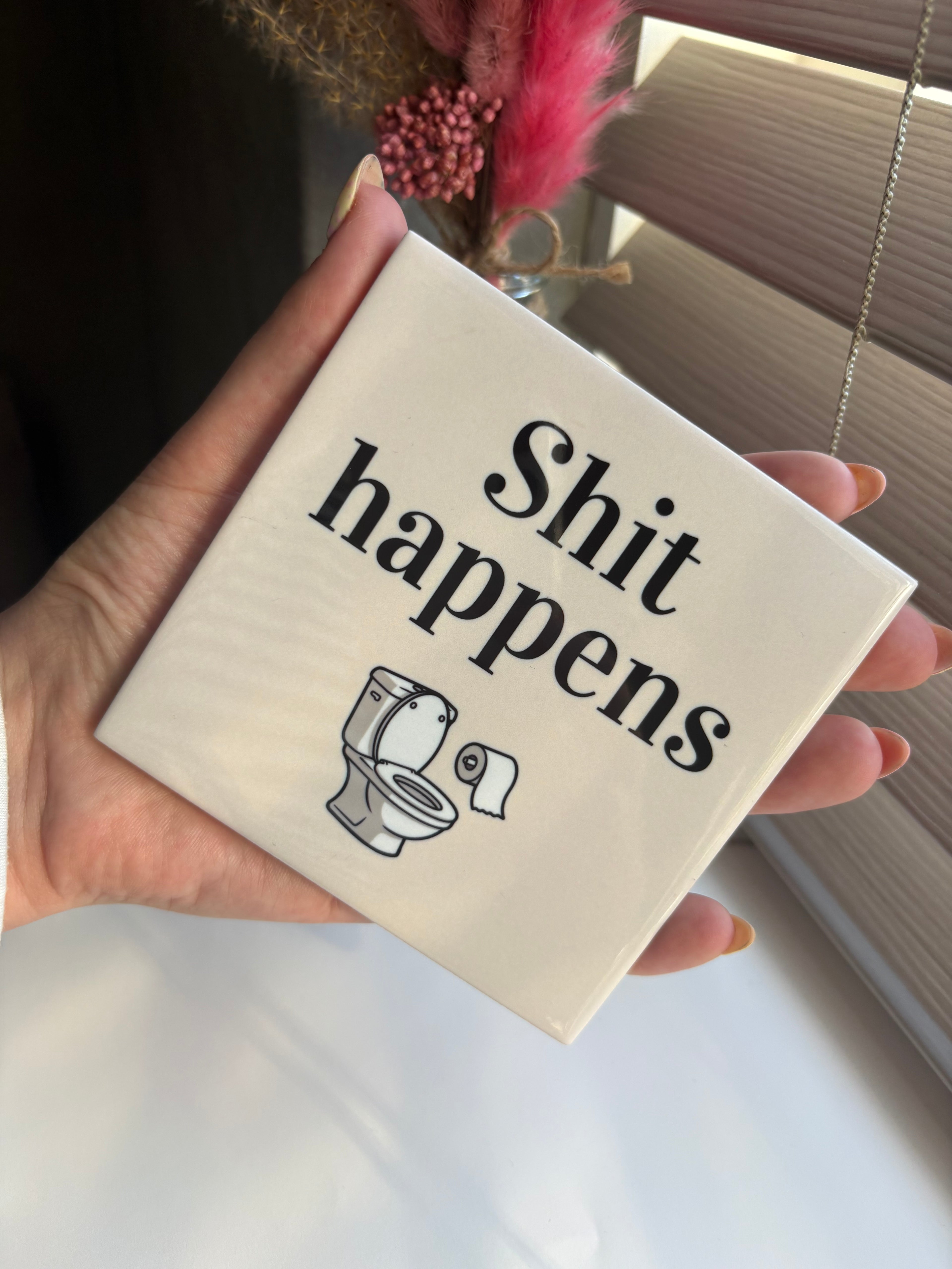 Tegeltje shit happens