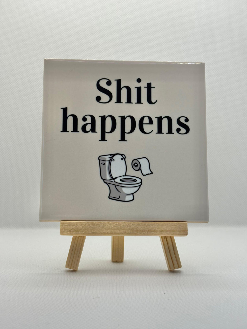 Tegeltje shit happens